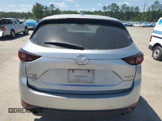 2020 Mazda CX-5 Touring z VIN JM3KFBCM2L1824072, wystawiony jako Copart lot #54825295 z przebiegiem 99 420 mil mil oraz Szkoda całkowita • Salvage title. Historia ofert i sprzedaży dostępna na DreamBid. Obrazek 6.