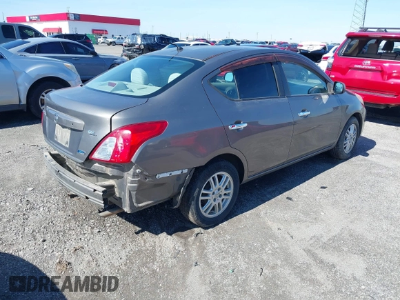 2012 Nissan Versa SV with VIN 3N1CN7AP1CL818558, listed as a IAAI auction lot 41592287 with 163,309 mi miles. Bid and sale history available at carsss.com. Image 4.