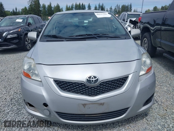 2009 Toyota Yaris with VIN JTDBT903391322248, listed as a IAAI auction lot 40112165 with 193,625 mi miles. Bid and sale history available at carsss.com. Image 12.