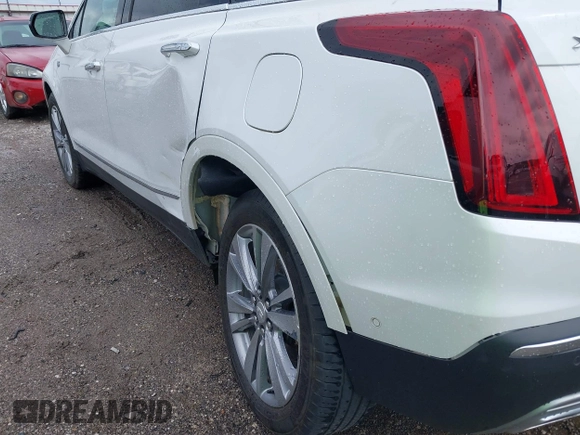 2023 Cadillac XT5 AWD Premium Luxury with VIN 1GYKNDRS9PZ199653, listed as a IAAI auction lot 42205799 with 23,751 mi miles and . Bid and sale history available at DreamBid. Image 17.