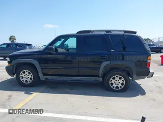 2001 Chevrolet Tahoe LT with VIN 1GNEK13T41R197657, listed as a IAAI auction lot 42164367 with 200,507 mi miles. Bid and sale history available at carsss.com. Image 14.