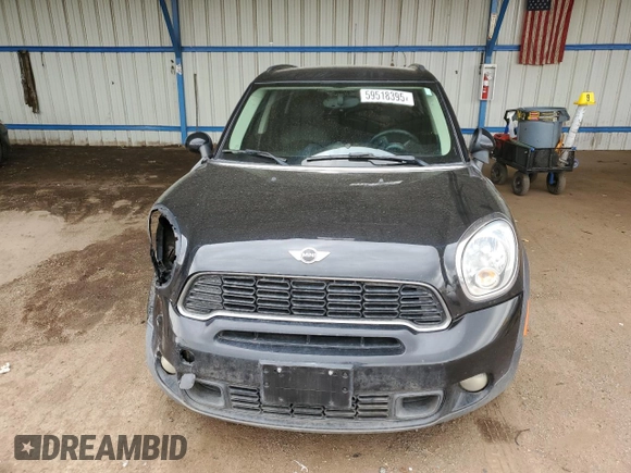 2014 MINI Countryman S with VIN WMWZC5C56EWP38065, listed as a Copart auction lot 59518395 with 91,106 mi miles and Salvage title. Bid and sale history available at DreamBid. Image 5.