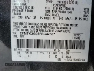 2015 Ford Edge SE with VIN 2FMTK3G95FBC42587, listed as a Copart auction lot 61586835 with 95,353 mi miles and Salvage title. Bid and sale history available at DreamBid. Image 13.