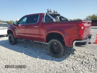 2020 Chevrolet Silverado 1500 LTZ with VIN 1GCUYGEL6LZ104384, listed as a Copart auction lot 74450304 with 76,305 mi miles and Salvage Title. Bid and sale history available at DreamBid. Image 2.