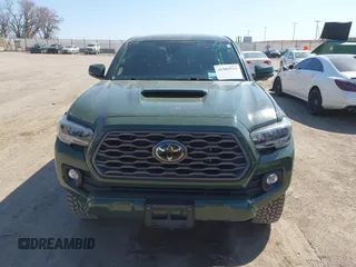 2022 Toyota Tacoma SR with VIN 3TMCZ5AN0NM470396, listed as a IAAI auction lot 41909515 with 35,997 mi miles and . Bid and sale history available at DreamBid. Image 13.