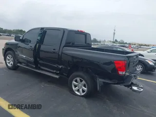 2014 Nissan Titan Pro-4X with VIN 1N6BA0EC1EN515685, listed as a IAAI auction lot 42423258 with 137,012 mi miles and . Bid and sale history available at DreamBid. Image 3.