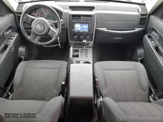 2011 Jeep Liberty Sport with VIN 1J4PP2GK9BW578623, listed as a Copart auction lot 41879405 with 142,144 mi miles and Salvage Title. Bid and sale history available at carsss.com. Image 8.