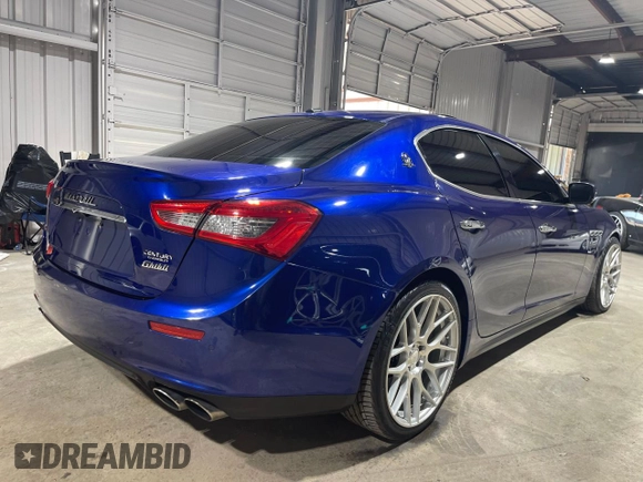 2014 Maserati Ghibli S Q4 z VIN ZAM57RTA0E1087454, wystawiony jako Copart lot #84060514 z przebiegiem 58 880 mil mil oraz Szkody całkowita. Historia ofert i sprzedaży dostępna na DreamBid. Obrazek 4.