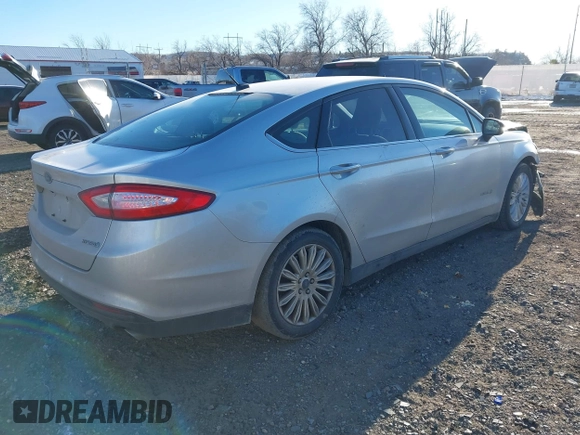 2015 Ford Fusion S Hybrid with VIN 3FA6P0UU7FR307568, listed as a IAAI auction lot 41421139 with 152,186 mi miles. Bid and sale history available at carsss.com. Image 4.