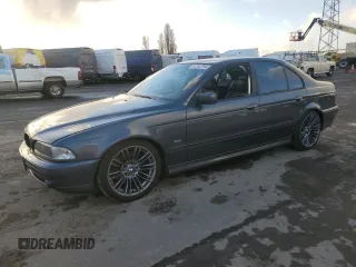 2000 BMW 5 Series 540i with VIN WBADN5348YGC95477, listed as a Copart auction lot 87242764 with 135,424 mi miles and Salvage Title. Bid and sale history available at carsss.com. Image 1.