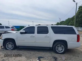 2014 Chevrolet Suburban LT with VIN 1GNSCJE08ER185472, listed as a IAAI auction lot 39849223 with 198,853 mi miles. Bid and sale history available at carsss.com. Image 14.