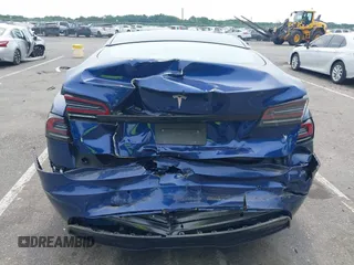 2022 Tesla Model S z VIN 5YJSA1E55NF493604, wystawiony jako IAAI lot #42503731 z przebiegiem 37 961 mil mil oraz . Historia ofert i sprzedaży dostępna na DreamBid. Obrazek 6.