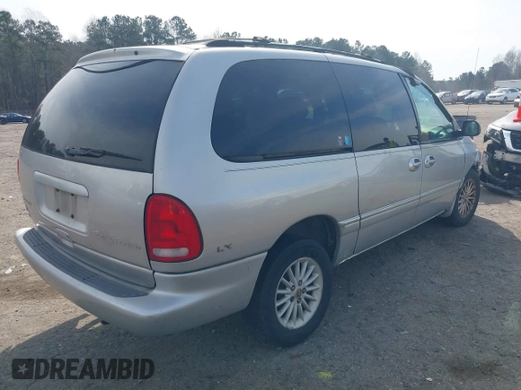 1999 Chrysler Town & Country LXi with VIN 1C4GP54L3XB899589, listed as a IAAI auction lot 41792430 with 248,850 mi miles. Bid and sale history available at carsss.com. Image 4.