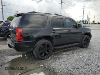 2010 Chevrolet Tahoe LTZ with VIN 1GNUKCE01AR127365, listed as a Copart auction lot 60711715 with 151,962 mi miles and Salvage title. Bid and sale history available at DreamBid. Image 3.