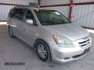 2005 Honda Odyssey EX-L z VIN 5FNRL38705B106488, wystawiony jako IAAI lot #42545141 z przebiegiem 199 619 mil mil oraz . Historia ofert i sprzedaży dostępna na DreamBid. Obrazek 1.