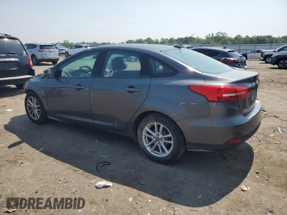 2017 Ford Focus SE with VIN 1FADP3F25HL202470, listed as a Copart auction lot 59941835 with 142,628 mi miles and Salvage title. Bid and sale history available at DreamBid. Image 2.