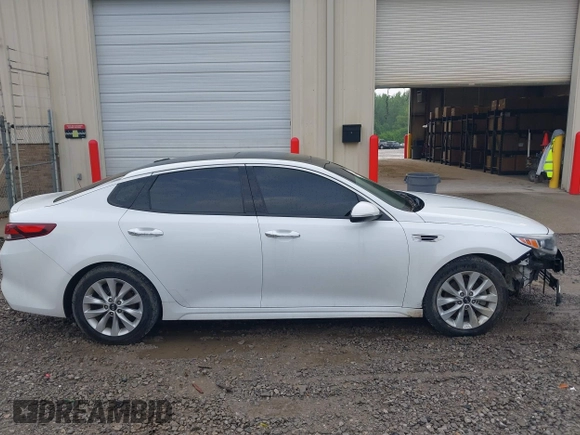 2018 Kia Optima LX z VIN 5XXGT4L3XJG246489, wystawiony jako IAAI lot #42107857 z przebiegiem 76 259 mil mil oraz . Historia ofert i sprzedaży dostępna na DreamBid. Obrazek 14.