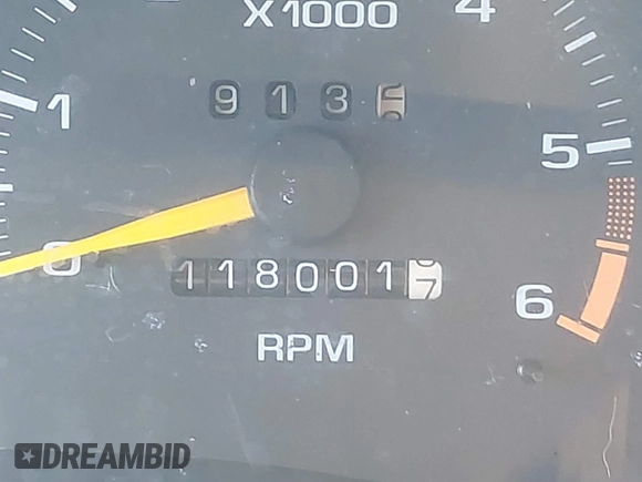 1997 GMC Jimmy SLS with VIN 1GKDT13WXV2567802, listed as a IAAI auction lot 41808103 with 118,001 mi miles. Bid and sale history available at carsss.com. Image 7.
