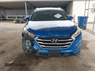 2018 Hyundai Tucson Sport with VIN KM8J33AL0JU803368, listed as a IAAI auction lot 41937235 with 64,163 mi miles and . Bid and sale history available at DreamBid. Image 13.
