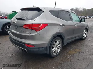 2013 Hyundai Santa Fe 2.0T Sport with VIN 5XYZWDLA3DG050022, listed as a IAAI auction lot 41957421 with 196,348 mi miles. Bid and sale history available at carsss.com. Image 4.
