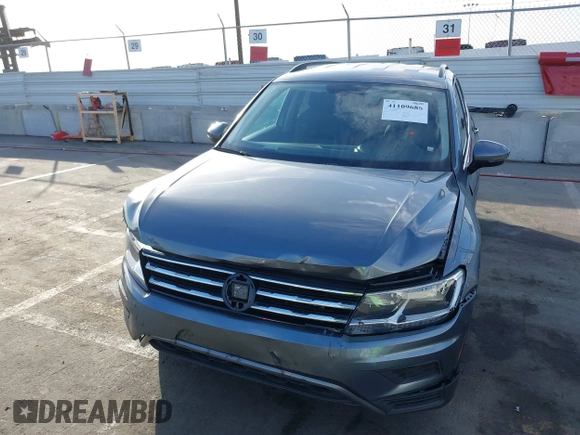 2021 Volkswagen Tiguan SE with VIN 3VV3B7AX8MM071303, listed as a IAAI auction lot 41109686 with 40,684 mi miles and . Bid and sale history available at DreamBid. Image 6.