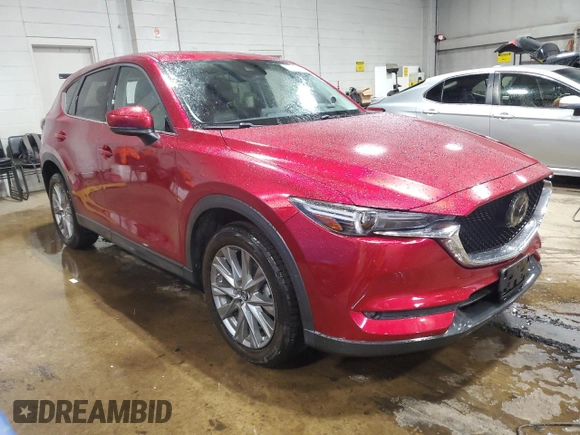 2020 Mazda CX-5 Grand Touring with VIN JM3KFBDM2L1771632, listed as a Copart auction lot 52894945 with 34,926 mi miles and Salvage Title. Bid and sale history available at carsss.com. Image 4.