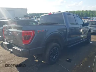 2022 Ford F-150 XL with VIN 1FTFW1E50NKE88686, listed as a IAAI auction lot 42155290 with 163,960 mi miles and . Bid and sale history available at DreamBid. Image 4.
