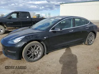 2019 Tesla Model 3 Mid Range z VIN 5YJ3E1EA7KF420025, wystawiony jako Copart lot #56149015 z przebiegiem 253 771 mil mil oraz Szkoda całkowita • Salvage title. Historia ofert i sprzedaży dostępna na DreamBid. Obrazek 1.