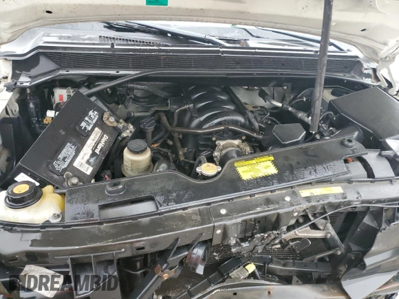 2008 Nissan Titan z VIN 1N6AA06E98N320594, wystawiony jako Copart lot #79463364 z przebiegiem 185 143 mil mil oraz Nie do naprawy • Non repairable. Historia ofert i sprzedaży dostępna na DreamBid. Obrazek 11.