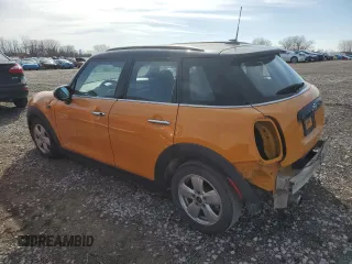 2016 MINI Hardtop 4 Door with VIN WMWXU1C50G2D57757, listed as a Copart auction lot 50025205 with 133,464 mi miles and Salvage title. Bid and sale history available at DreamBid. Image 2.