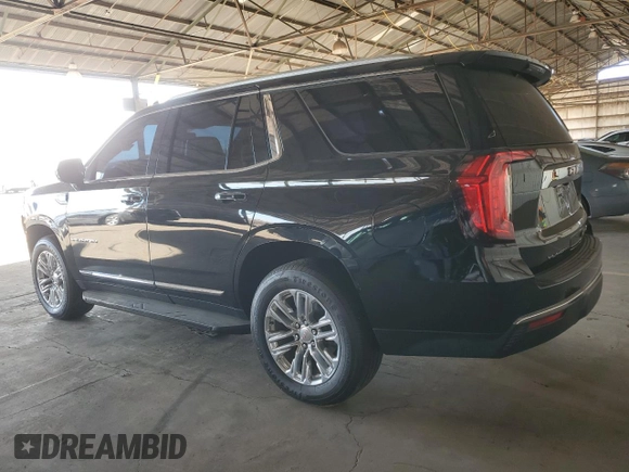 2021 GMC Yukon SLT with VIN 1GKS1BKD3MR281220, listed as a Copart auction lot 74983974 with 95,144 mi miles and Salvage Title. Bid and sale history available at carsss.com. Image 2.