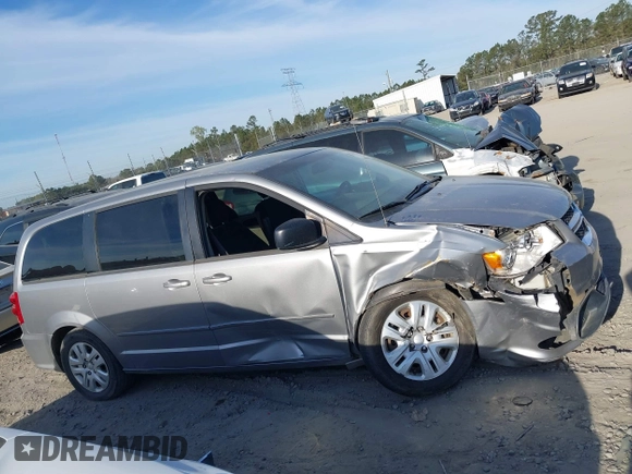 2016 Dodge Grand Caravan SE with VIN 2C4RDGBG5GR314936, listed as a IAAI auction lot 41889795 with 192,621 mi miles and . Bid and sale history available at DreamBid. Image 13.