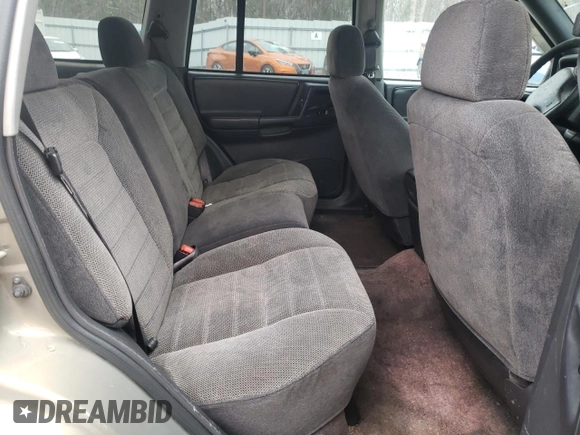 1996 Jeep Grand Cherokee Laredo with VIN 1J4FX58S5TC248122, listed as a Copart auction lot 45843935 with 295,521 mi miles and Salvage Title. Bid and sale history available at carsss.com. Image 10.