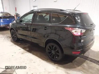 2017 Ford Escape SE with VIN 1FMCU9GD8HUF04133, listed as a IAAI auction lot 41390354 with 93,139 mi miles. Bid and sale history available at carsss.com. Image 3.