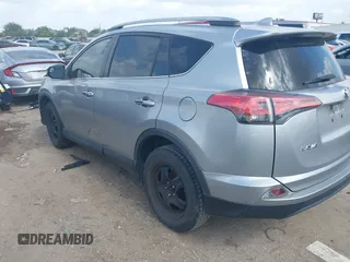 2018 Toyota RAV4 LE with VIN 2T3BFREV8JW758553, listed as a IAAI auction lot 42539300 with 116,337 mi miles and . Bid and sale history available at DreamBid. Image 3.