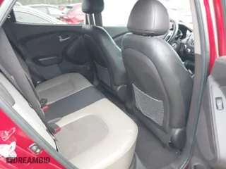 2012 Hyundai Tucson Limited with VIN KM8JU3ACXCU345113, listed as a IAAI auction lot 41946239 with 173,007 mi miles. Bid and sale history available at carsss.com. Image 8.