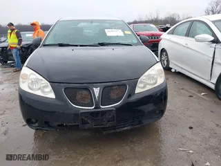 2006 Pontiac G6 6-Cyl with VIN 1G2ZG558364103160, listed as a IAAI auction lot 41997379 with 1 mi miles. Bid and sale history available at carsss.com. Image 12.