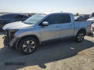 2017 Honda Ridgeline RTL-T z VIN 5FPYK3F62HB018031, wystawiony jako Copart lot #54959575 z przebiegiem 122 295 mil mil oraz Szkoda całkowita • Salvage title. Historia ofert i sprzedaży dostępna na DreamBid. Obrazek 1.