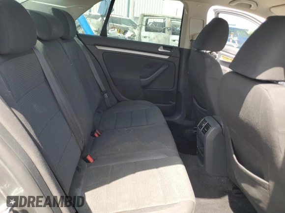 2010 Volkswagen Jetta S with VIN 3VWJZ7AJ2AM005738, listed as a Copart auction lot 55462935 with 173,514 mi miles and Salvage title. Bid and sale history available at DreamBid. Image 10.