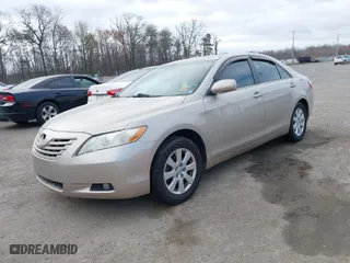 2007 Toyota Camry CE with VIN 4T1BE46K27U628277, listed as a IAAI auction lot 41911750 with 241,374 mi miles. Bid and sale history available at carsss.com. Image 2.