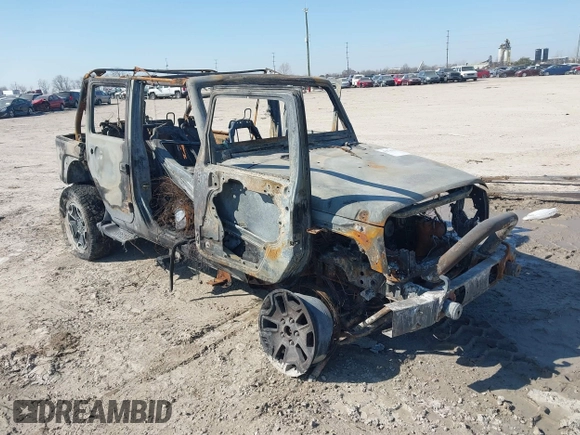 2013 Jeep Wrangler Unlimited Sport z VIN 1C4BJWDG5DL591947, wystawiony jako IAAI lot #41753728 z przebiegiem Nie podano mil oraz . Historia ofert i sprzedaży dostępna na DreamBid. Obrazek 1.