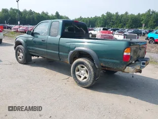 2002 Toyota Tacoma with VIN 5TEWM72NX2Z097369, listed as a IAAI auction lot 42476892 with 90,855 mi miles and . Bid and sale history available at DreamBid. Image 3.