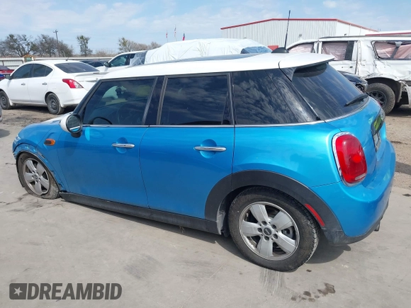 2017 MINI Hardtop 4 Door Cooper with VIN WMWXU1C53H2E17614, listed as a IAAI auction lot 41686204 with 53,409 mi miles and . Bid and sale history available at DreamBid. Image 15.