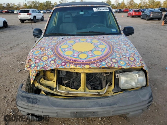 2003 Chevrolet Tracker z VIN 2CNBE18C136928311, wystawiony jako Copart lot #84463154 z przebiegiem 118 195 mil mil oraz Szkoda całkowita • Salvage title. Historia ofert i sprzedaży dostępna na DreamBid. Obrazek 5.
