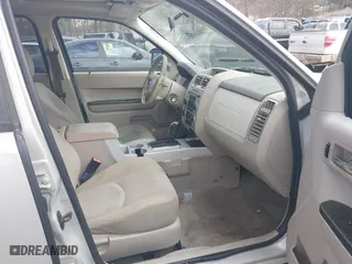 2008 Mercury Mariner with VIN 4M2CU81Z78KJ42675, listed as a IAAI auction lot 41594565 with 151,183 mi miles. Bid and sale history available at carsss.com. Image 5.