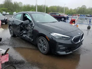 2021 BMW 2 Series 228i xDrive with VIN WBA73AK07M7H58410, listed as a Copart auction lot 55775995 with 76,921 mi miles and Salvage title. Bid and sale history available at DreamBid. Image 4.