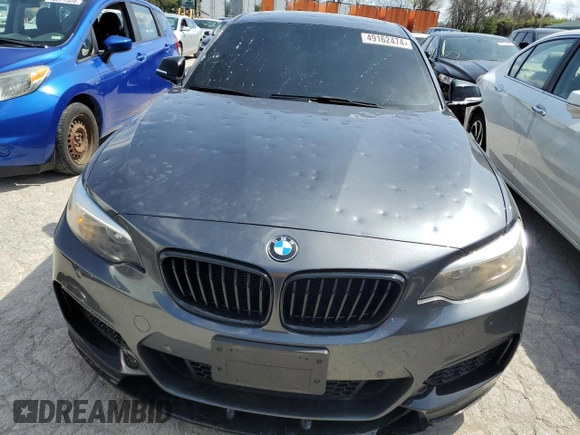 2015 BMW 2 Series 228i with VIN WBA1F5C57FV256779, listed as a Copart auction lot 49162474 with 69,078 mi miles and Salvage Title. Bid and sale history available at carsss.com. Image 5.