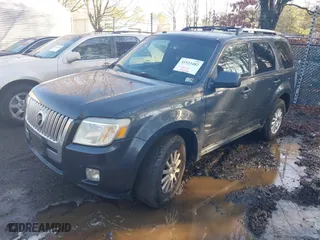 2010 Mercury Mariner Premier with VIN 4M2CN8H78AKJ02824, listed as a IAAI auction lot 41533482 with 234,459 mi miles. Bid and sale history available at carsss.com. Image 2.