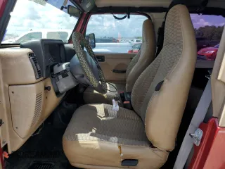 1999 Jeep Wrangler Sport with VIN 1J4FY19S8XP436667, listed as a Copart auction lot 59304544 with 167,747 mi miles and Clean Title. Bid and sale history available at carsss.com. Image 7.
