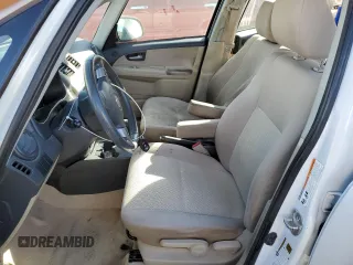 2013 Suzuki SX4 LE with VIN JS2YC5A30D6101502, listed as a Copart auction lot 77066564 with 96,626 mi miles and Salvage Title. Bid and sale history available at carsss.com. Image 7.